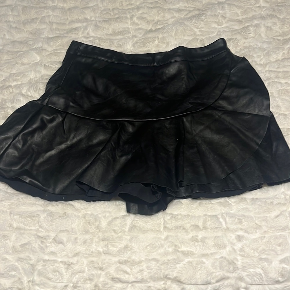 Black imitation leather skort, size med, fits like a 4